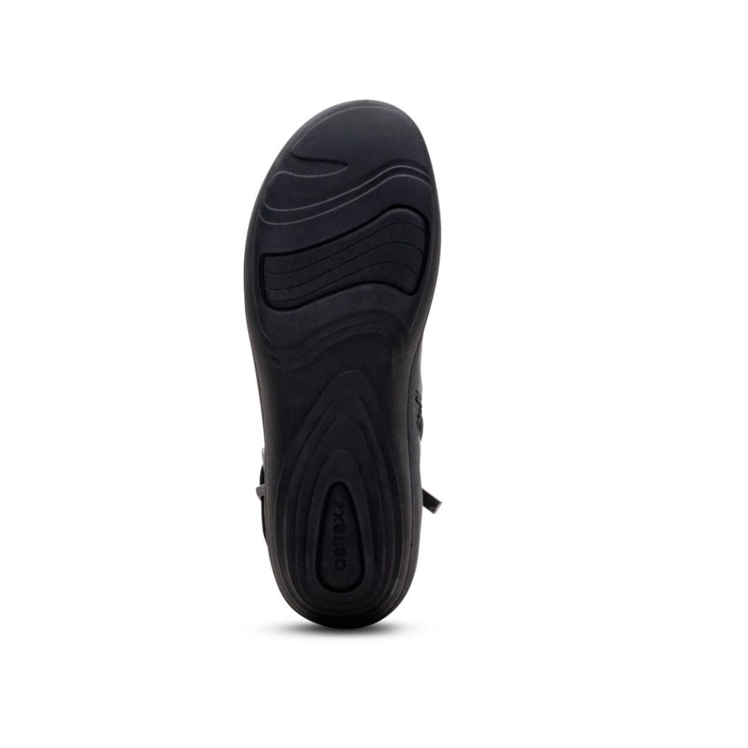 Sole of Aetrex Buckle Boot in Black