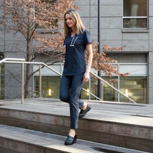 KEL-601-Lifestyle Women in Scrubs Wearing Alegria Keli in Black Nappa Walking Outside