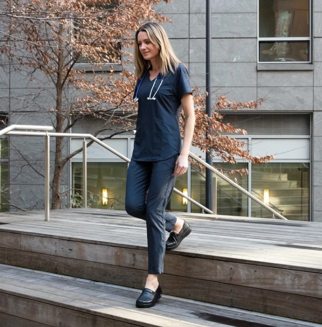 KEL-601-Lifestyle Women in Scrubs Wearing Alegria Keli in Black Nappa Walking Outside